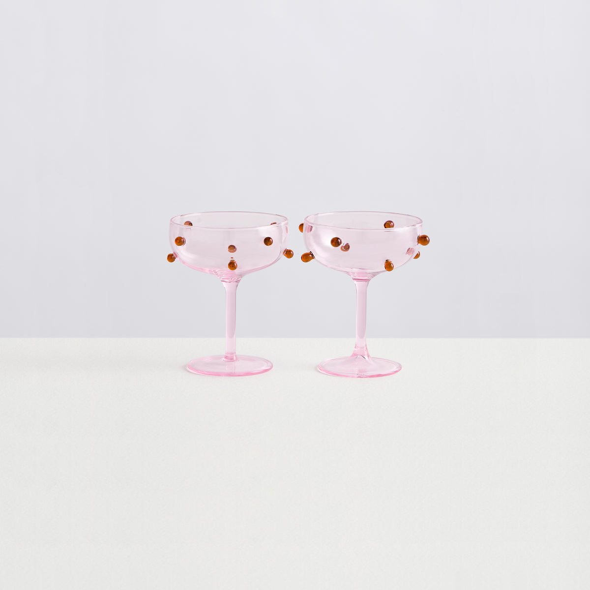 2 Champagne Coupes | Pink &amp; Amber
